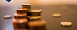 a close up of stacks of coins on a table
